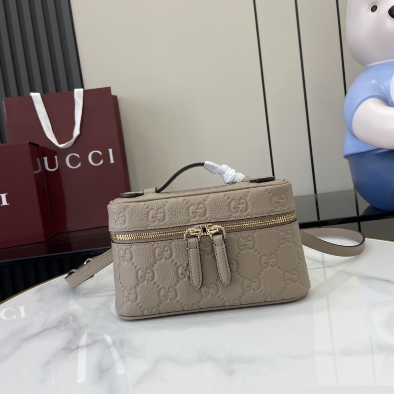 G*u*i cosmetic bags